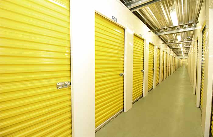 Indoor storage units with roll-up doors.